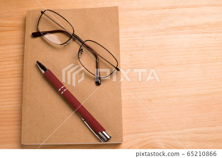 Notepad on the table Notepad on the table 65210866