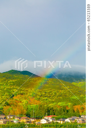 Rainbow at the foot of the mountain Rainbow at the foot of the mountain 65213389
