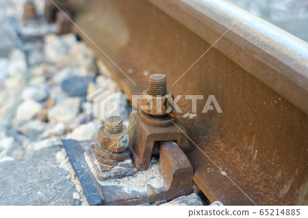 Closeup of screw mount of rails on the concrete Closeup of screw mount of rails on the concrete 65214885