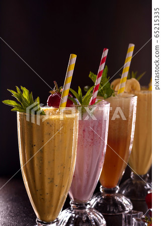 Several glasses with cold refreshing fries Several glasses with cold refreshing fries 65215335