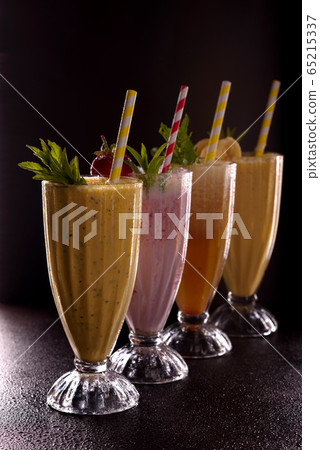 Several glasses with cold refreshing fries Several glasses with cold refreshing fries 65215337