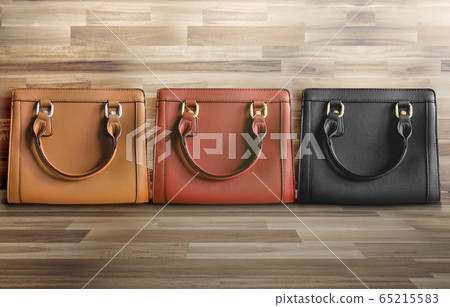 Bags of fashion items in various colors 65215583