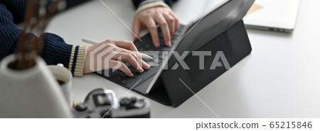 Cropped shot of female freelancer working on Cropped shot of female freelancer working on 65215846