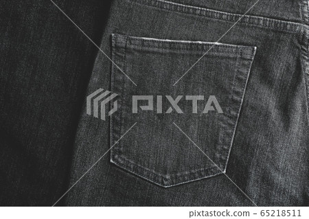 Black jeans textured background, close up Black jeans textured background, close up 65218511