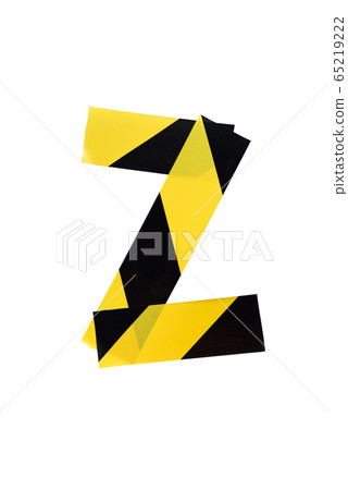 Letter Z from yellow black warning tape on white Letter Z from yellow black warning tape on white 65219222