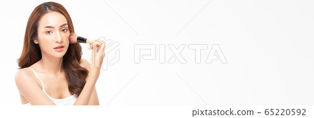 Beauty asian woman  brown hair looking smile in camera happiness and hold make up brush  and cheerful with make up brush,Beauty Concept on white background. 65220592