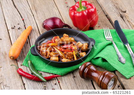 chicken briskaet fried on pan with vegetables chicken briskaet fried on pan with vegetables 65221261