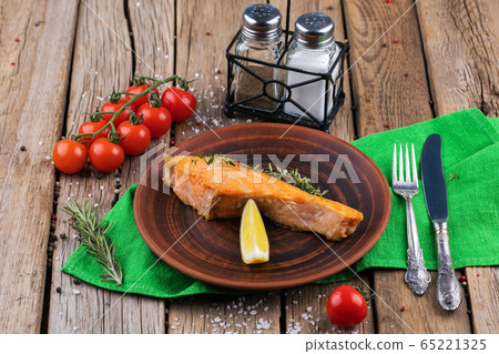 Plate with backed salmon steaks. Plate with backed salmon steaks. 65221325