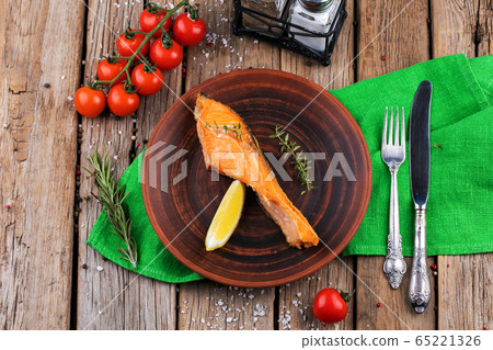 Plate with backed salmon steaks. Plate with backed salmon steaks. 65221326
