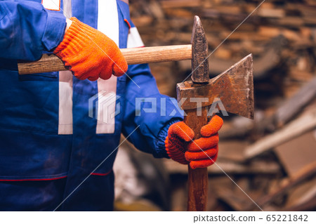 Close up of hands of repairman, professional builder working outdoors, repairing Close up of hands of repairman, professional builder working outdoors, repairing 65221842