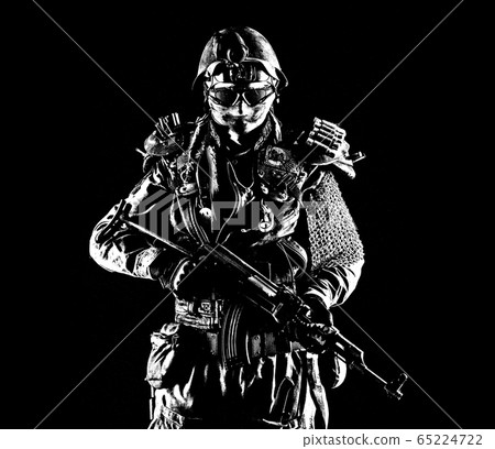 post apocalypse survivor with weapons. 65224722