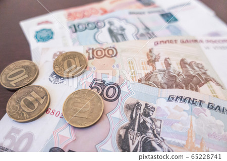 Russian ruble banknotes and coins 65228741