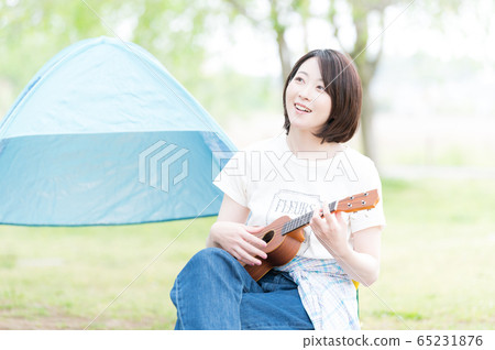 Outdoor musical instrument woman Outdoor musical instrument woman 65231876
