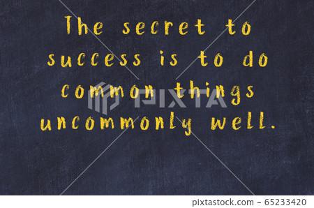 Chalk wise inscription on black chalkboard Chalk wise inscription on black chalkboard 65233420