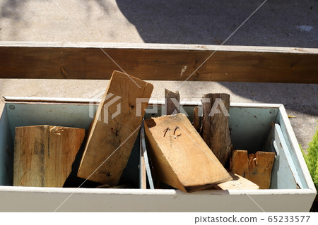 in the courtyard of the house are chopped firewood for a cold winter in northern Israel in the courtyard of the house are chopped firewood for a cold winter in northern Israel 65233577