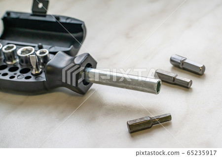compact screwdriver with bits folded in the handle compact screwdriver with bits folded in the handle 65235917