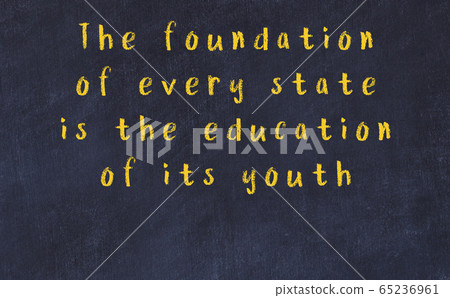 Black chalkboard with wise inscription on it 65236961