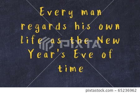 Chalk wise inscription on black chalkboard 65236962