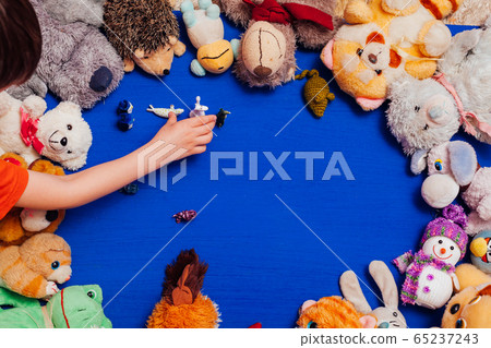 Lots of children's toys for child development games on a blue background 65237243