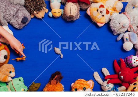 Lots of children's toys for child development games on a blue background Lots of children's toys for child development games on a blue background 65237246