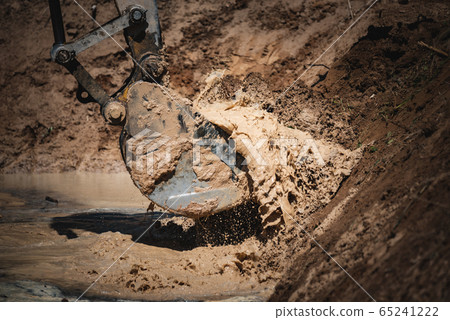 Digging the soil with large machinery Excavators 65241222