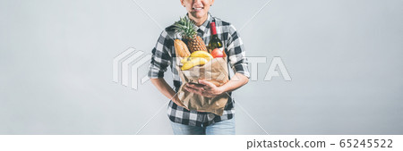 Food delivery service. Young asian man holding Food delivery service. Young asian man holding 65245522