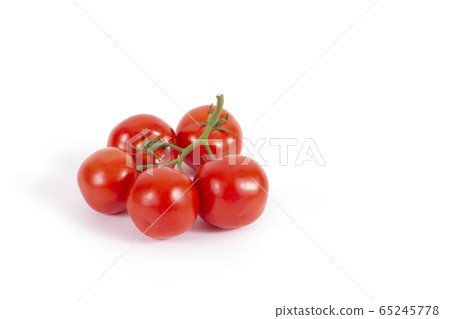 Fresh tomatoes on branch isolated on white. Branch Fresh tomatoes on branch isolated on white. Branch 65245778