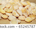 Raw split peas of yellow variety on the wooden 65245787