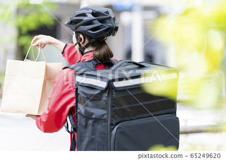 Women bicycle food delivery Women bicycle food delivery 65249620