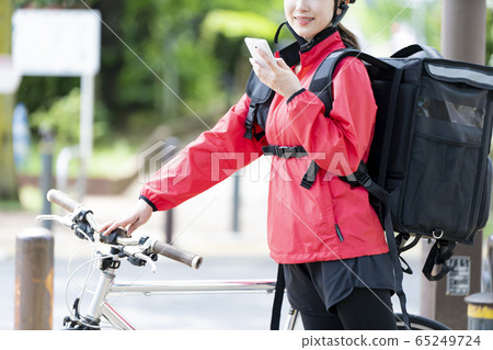 Female food delivery image 65249724