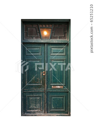 Green wooden weathered door isolated Green wooden weathered door isolated 65251210