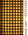 Orange light through black wood square pattern 65251560