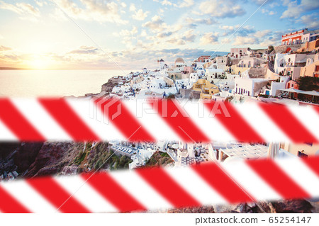 Santorini with warning tape. Oia town, Greece Santorini with warning tape. Oia town, Greece 65254147