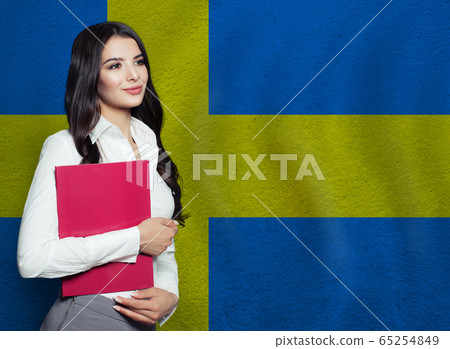 Young woman with red book. Learn or business Young woman with red book. Learn or business 65254849