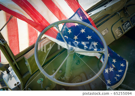 ww2 military vehicle with American flag 65255094