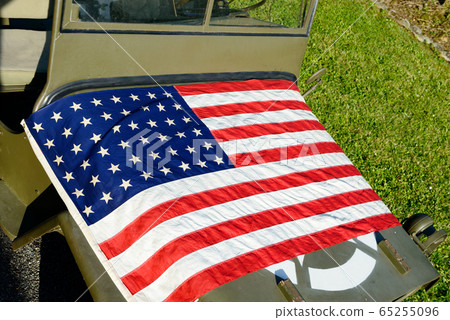 ww2 military vehicle with American flag 65255096