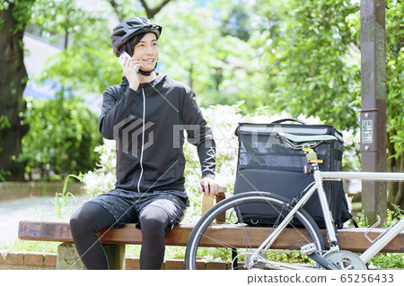Food delivery delivery agent receiving an order 65256433