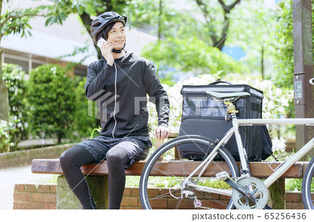 Food delivery delivery agent receiving an order Food delivery delivery agent receiving an order 65256436