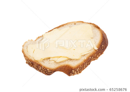Sliced bread with butter isolated on white 65258676