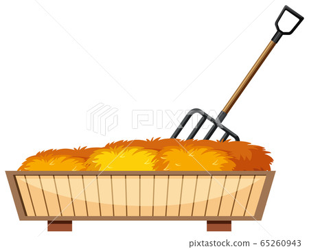 Hay and fork in wooden box 65260943