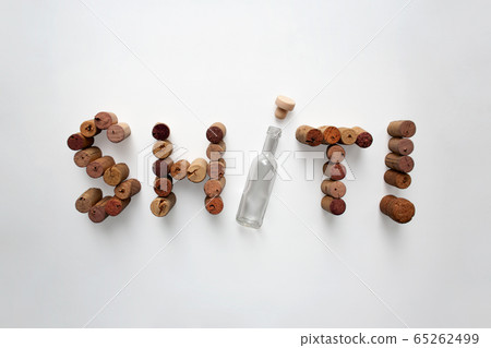 Wine corks Sh*t! word abstract composition isolated on white background 65262499
