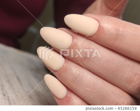 Closeup photo of a beautiful female hands with Closeup photo of a beautiful female hands with 65266159