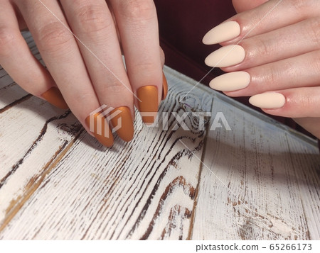Amazing natural nails. Women's hands with clean Amazing natural nails. Women's hands with clean 65266173