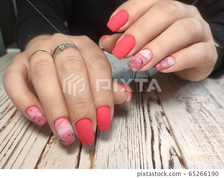 Closeup photo of a beautiful female hands with Closeup photo of a beautiful female hands with 65266190