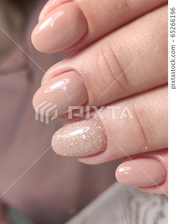 Amazing natural nails. Women's hands with clean 65266196