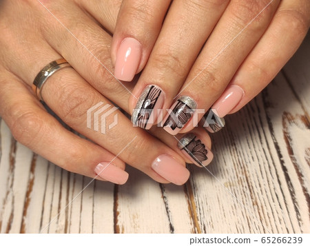 fashion manicure of nails on a beautiful fashion manicure of nails on a beautiful 65266239