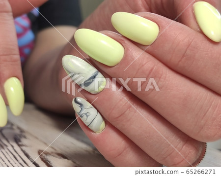 Amazing natural nails. Women's hands with clean Amazing natural nails. Women's hands with clean 65266271