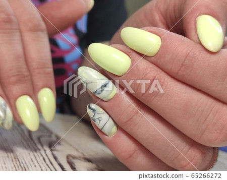 fashion manicure of nails on a beautiful fashion manicure of nails on a beautiful 65266272