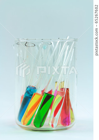 Test tubes with different solutions 65267682