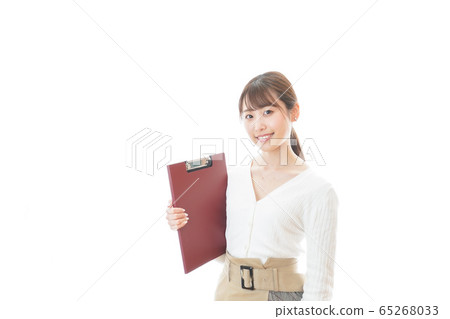 A young woman with materials smiling A young woman with materials smiling 65268033